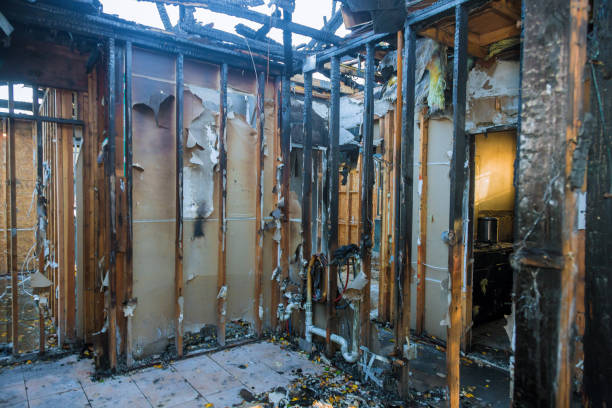 Professional Fire Damage Restoration technician working in Brookside, NJ